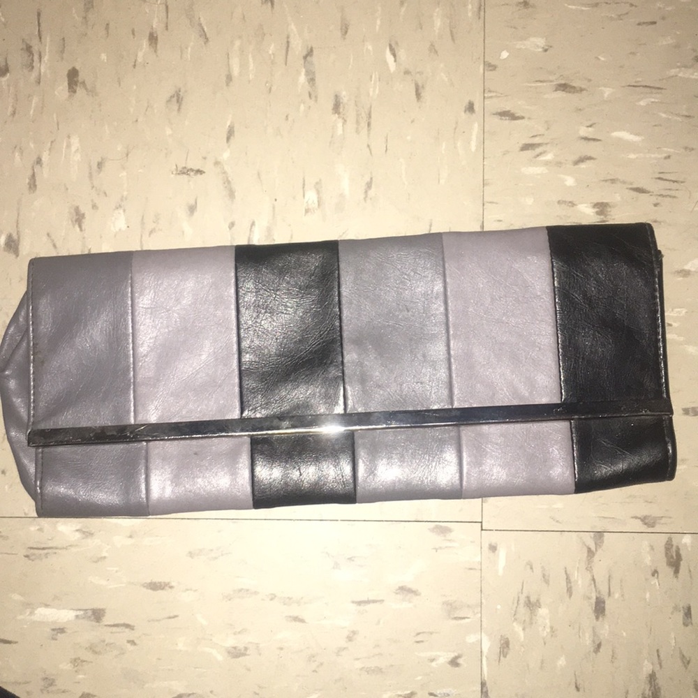 Gray and black clutch